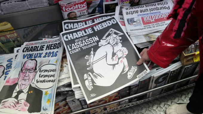 Charlie Hebdo blasted for migrant cartoon – again