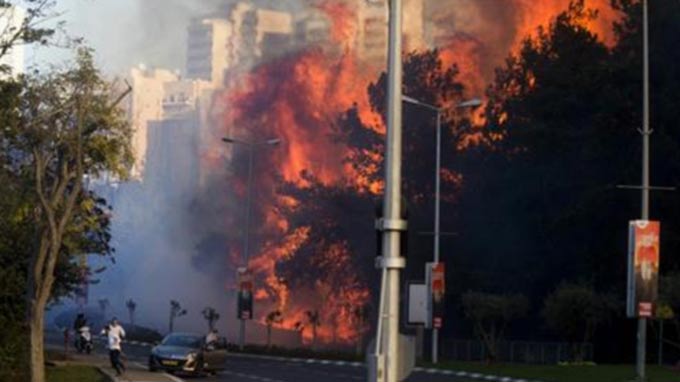 Israel: Tens of thousands flee Haifa wildfires