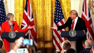 Donald Trump 'committed to NATO', says May in US visit