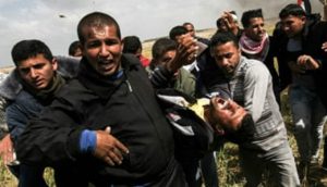 Video shows Palestinian shot dead with back to Israeli snipers