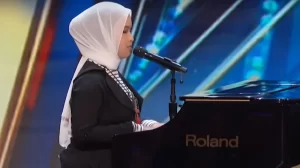 Putri Ariani receives the GOLDEN BUZZER from Simon Cowell