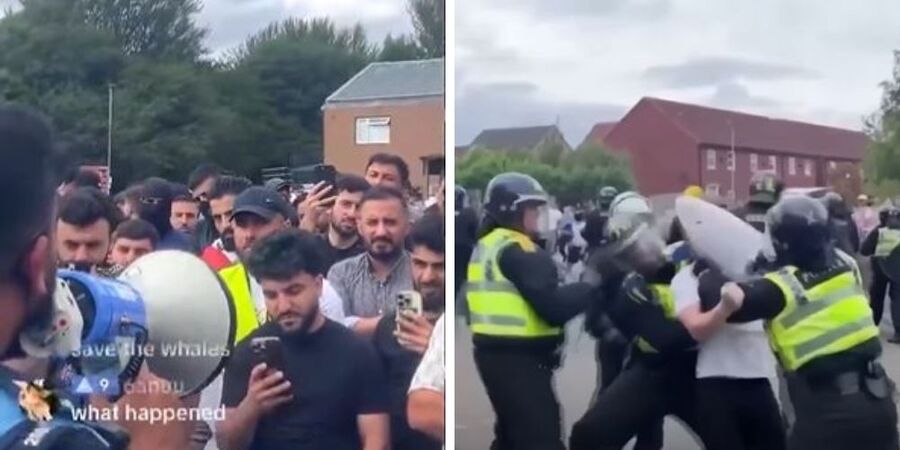 Police tell Muslim patrol group how to avoid arrest while pursuing mass migration protesters in Stoke, England