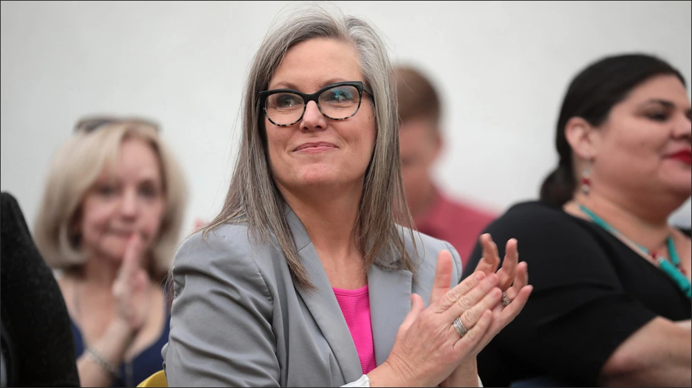Arizona Governor Katie Hobbs speaking at a press conference regarding state legislative vetoes.